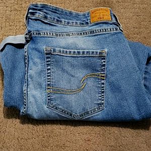 Women's Levi Signature Mid-Rise slim boyfriend jeans.